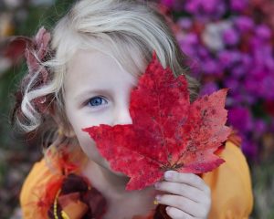 Child with a leaf photo